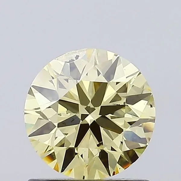 0.99ct ROUND Fancy Yellow SI2 Coloured Lab diamond