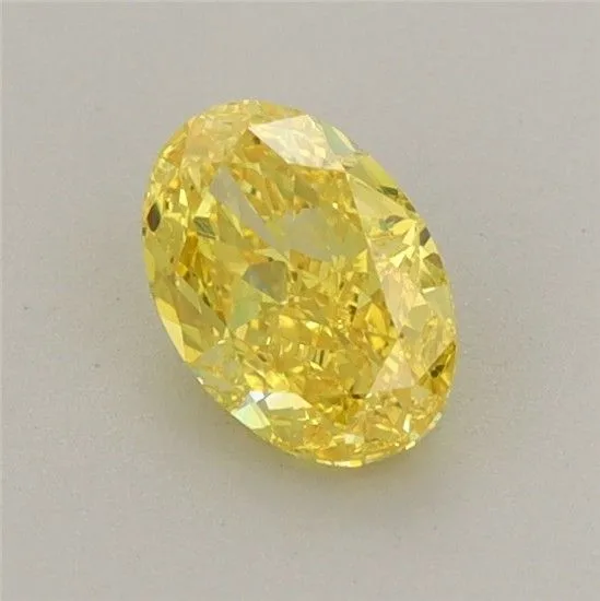 0.68ct OVAL Fancy Vivid Yellow VS1 Coloured Lab diamond