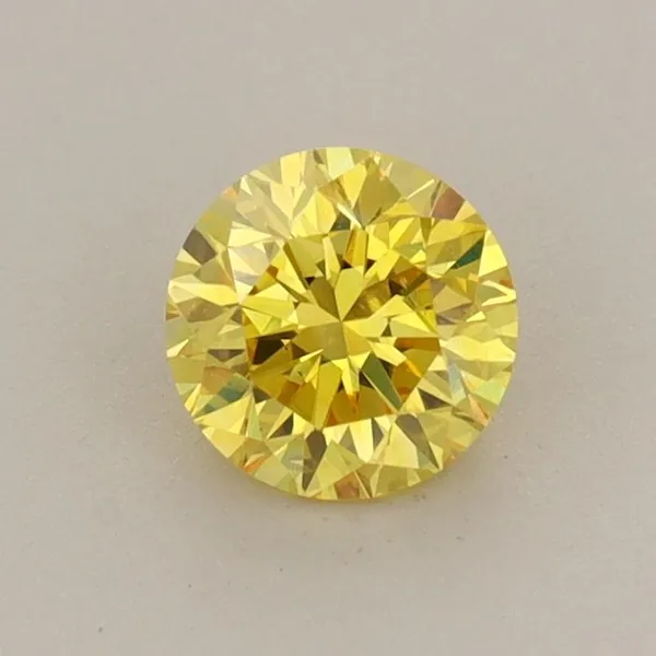 0.56ct ROUND Fancy Vivid Yellow SI1 Coloured Lab diamond