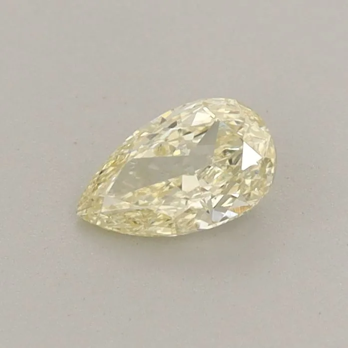 0.31ct PEAR Fancy Light Yellow VS2 Coloured Lab diamond
