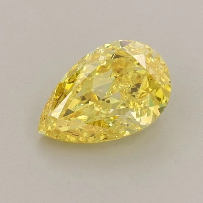 0.76ct PEAR Fancy Vivid Yellow VS1 Coloured Lab diamond