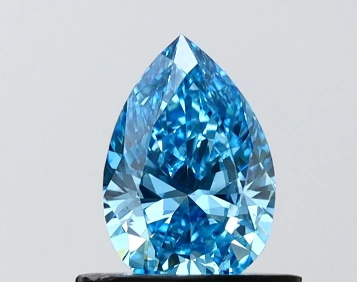 0.69ct PEAR Fancy Vivid Blue VVS2 Coloured Lab diamond