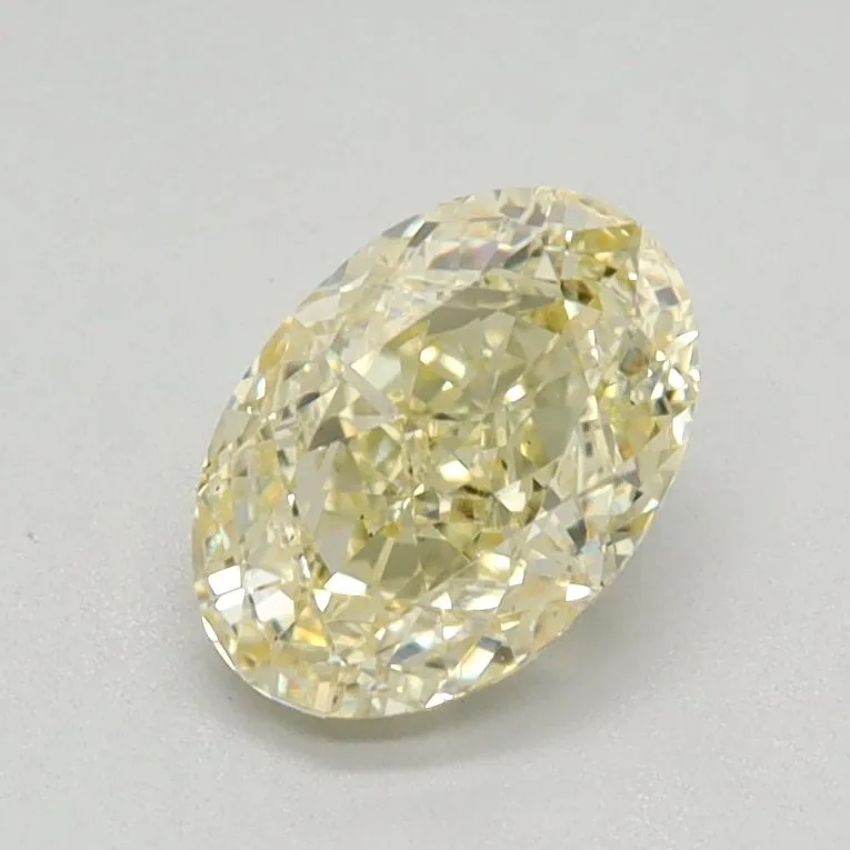 0.77ct OVAL Fancy Yellow VS2 Coloured Lab diamond