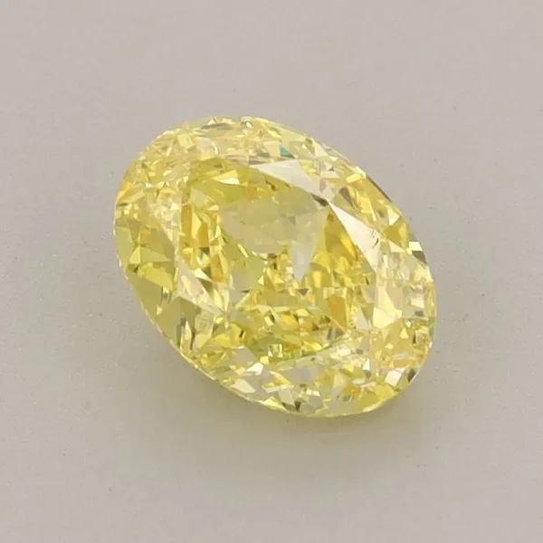 0.79ct OVAL Fancy Vivid Yellow VS1 Coloured Lab diamond