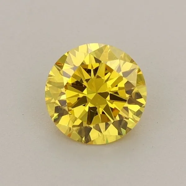 0.63ct ROUND Fancy Vivid Yellow VS2 Coloured Lab diamond