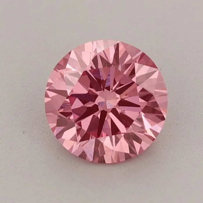 0.77ct ROUND Fancy Vivid Pink VS1 Coloured Lab diamond