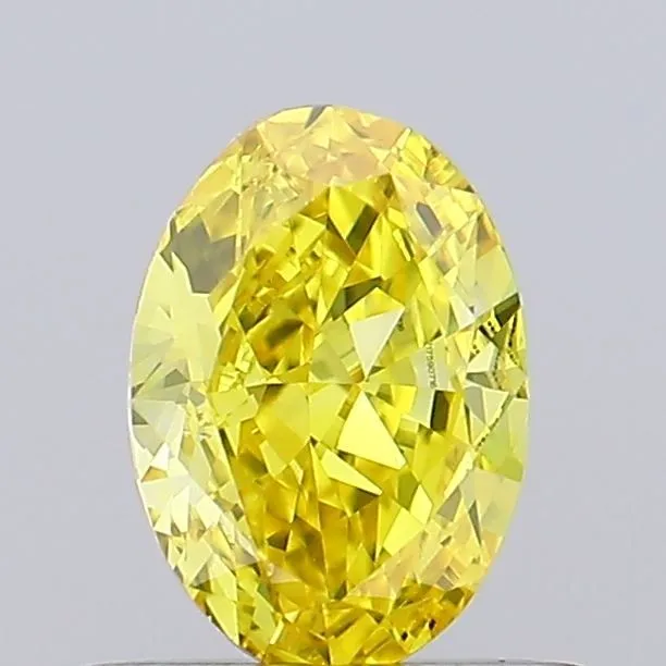 0.59ct OVAL Fancy Vivid Yellow VS1 Coloured Lab diamond