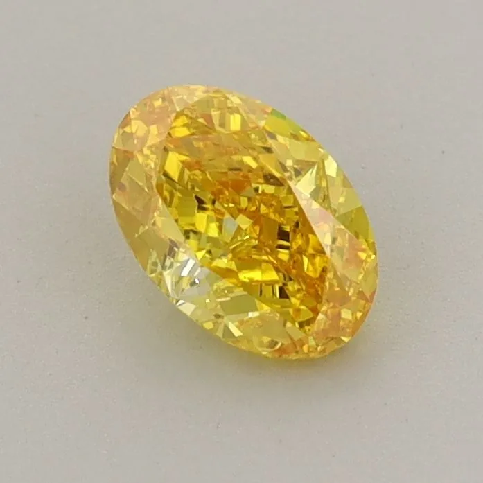 0.63ct OVAL Fancy Vivid Yellow VS1 Coloured Lab diamond
