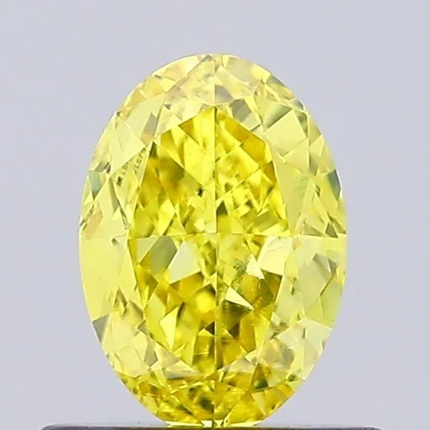0.59ct OVAL Fancy Vivid Yellow VS1 Coloured Lab diamond