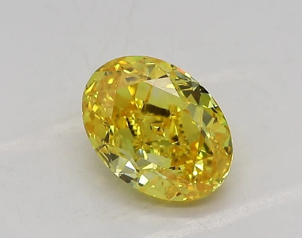 1.06ct OVAL Fancy Vivid Yellow VVS1 Coloured Lab diamond