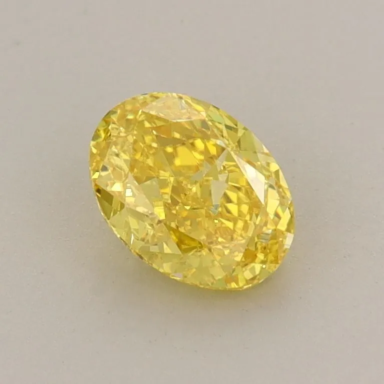 0.72ct OVAL Fancy Vivid Yellow VS1 Coloured Lab diamond
