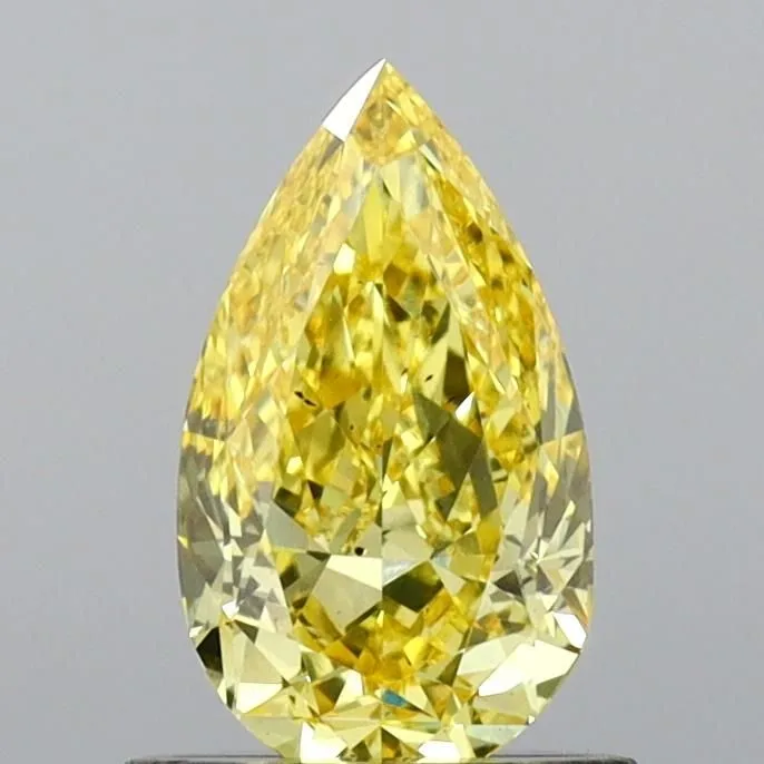 0.88ct PEAR Fancy Vivid Yellow SI1 Coloured Lab diamond
