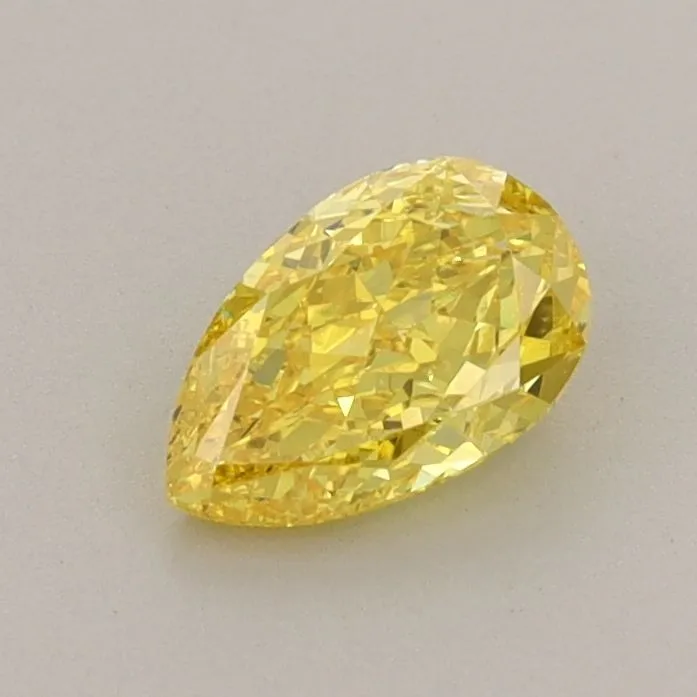 0.64ct PEAR Fancy Vivid Yellow VVS2 Coloured Lab diamond