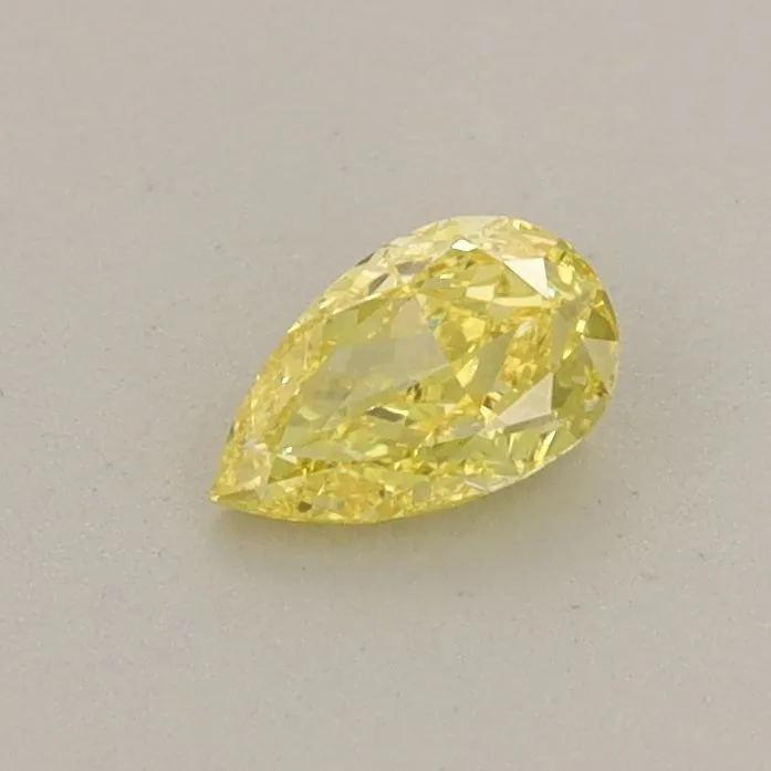 0.31ct PEAR Fancy Vivid Yellow VVS2 Coloured Lab diamond