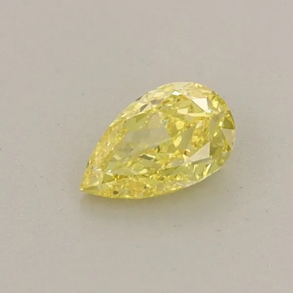 0.31ct PEAR Fancy Vivid Yellow VVS2 Coloured Lab diamond