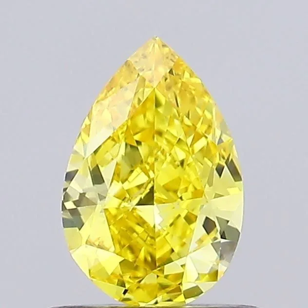 0.56ct PEAR Fancy Vivid Yellow VVS2 Coloured Lab diamond