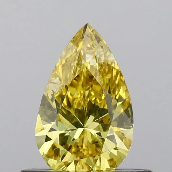 0.51ct PEAR Fancy Vivid Yellow SI2 Coloured Lab diamond