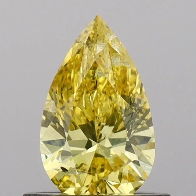 0.62ct PEAR Fancy Vivid Yellow SI2 Coloured Lab diamond