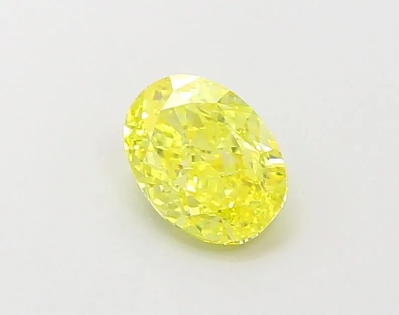 0.99ct OVAL Fancy Vivid Yellow VVS2 Coloured Lab diamond