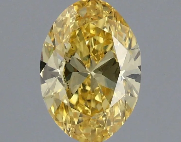 0.57ct OVAL Fancy Vivid Yellow VS1 Coloured Lab diamond