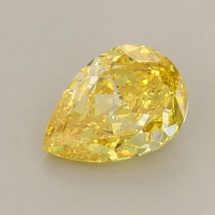 0.74ct PEAR Fancy Vivid Yellow VS1 Coloured Lab diamond