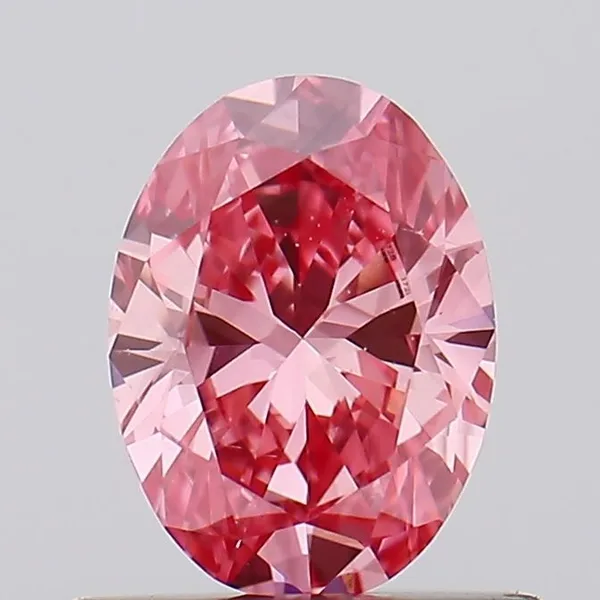 0.56ct OVAL Fancy Vivid Pink VS2 Coloured Lab diamond