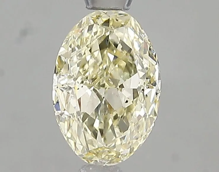 1.01ct OVAL Fancy Light Yellow VS2 Coloured Lab diamond