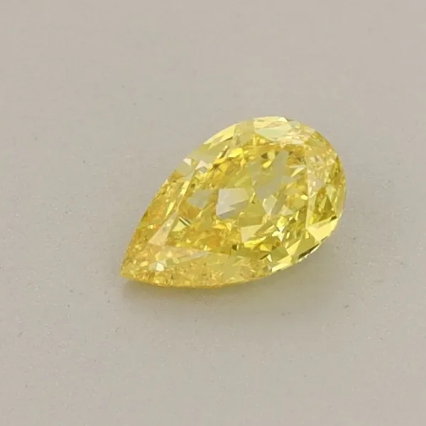 0.31ct PEAR Fancy Vivid Yellow VVS2 Coloured Lab diamond