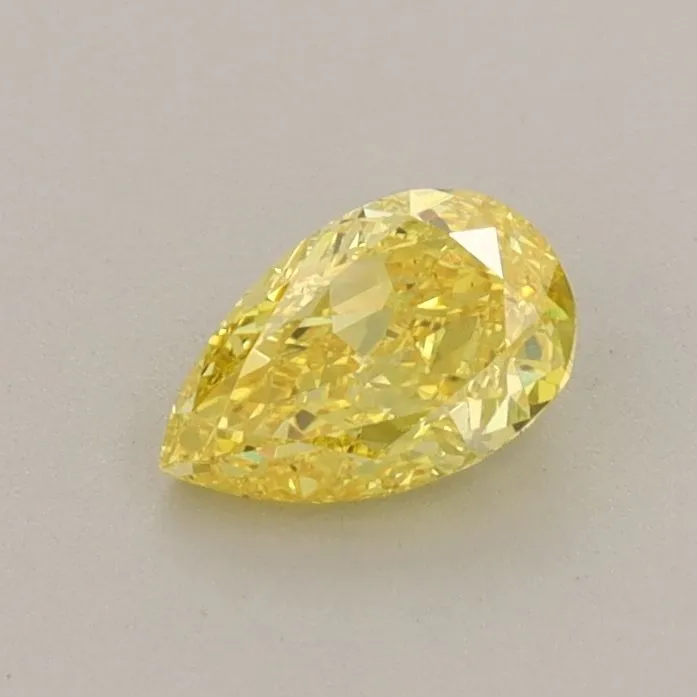 0.58ct PEAR Fancy Vivid Yellow VS1 Coloured Lab diamond