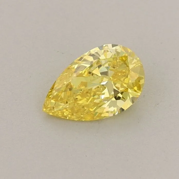 0.31ct PEAR Fancy Vivid Yellow VVS2 Coloured Lab diamond