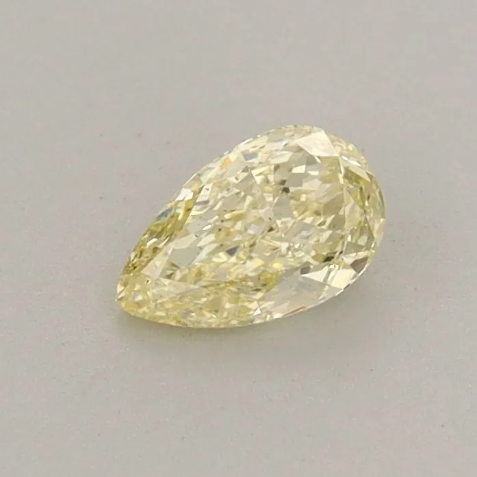 0.32ct PEAR Fancy Light Yellow VS2 Coloured Lab diamond