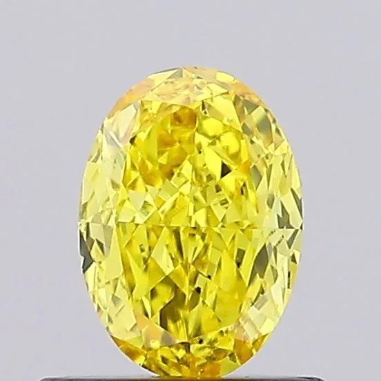 0.57ct OVAL Fancy Vivid Yellow VS1 Coloured Lab diamond
