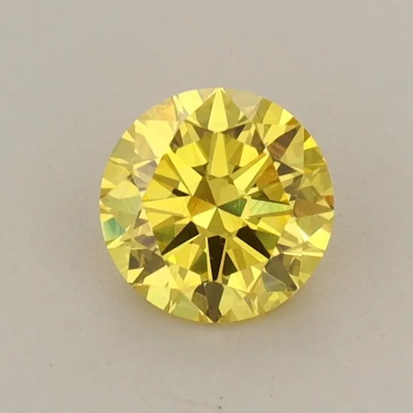 0.61ct ROUND Fancy Vivid Yellow VS1 Coloured Lab diamond