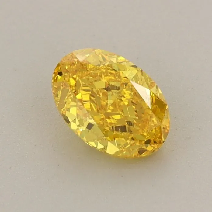 0.59ct OVAL Fancy Vivid Yellow VS2 Coloured Lab diamond
