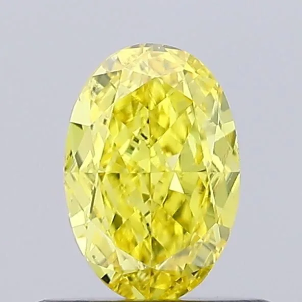 0.59ct OVAL Fancy Vivid Yellow VS1 Coloured Lab diamond
