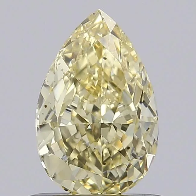 0.86ct PEAR Fancy Light Yellow VS2 Coloured Lab diamond