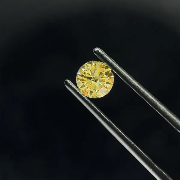 0.7ct ROUND Fancy Intense Yellow VS2 Coloured Lab diamond