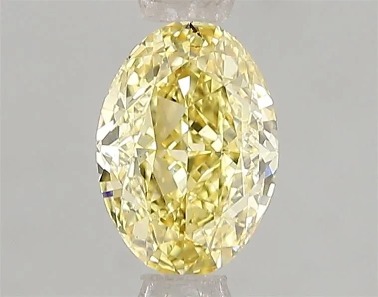 1.06ct OVAL Fancy Vivid Yellow VS2 Coloured Lab diamond