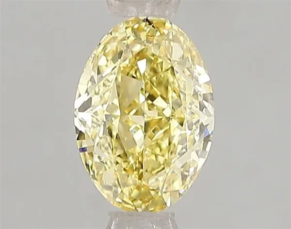 1.06ct OVAL Fancy Vivid Yellow VS2 Coloured Lab diamond