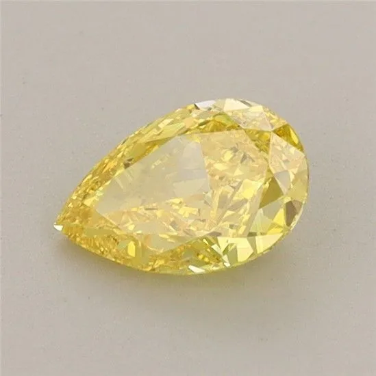 0.67ct PEAR Fancy Vivid Yellow VVS2 Coloured Lab diamond