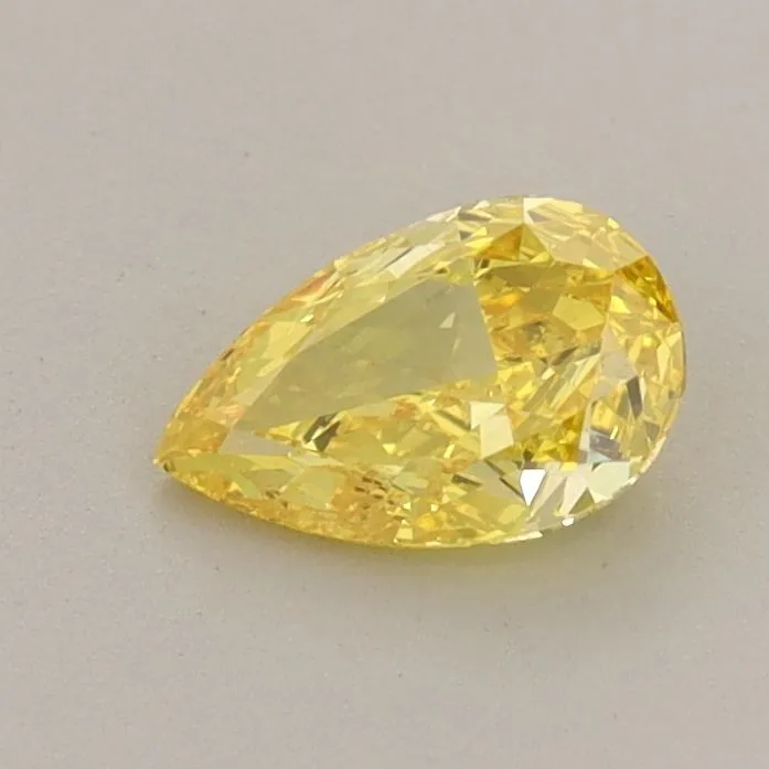 0.52ct PEAR Fancy Vivid Yellow VS1 Coloured Lab diamond