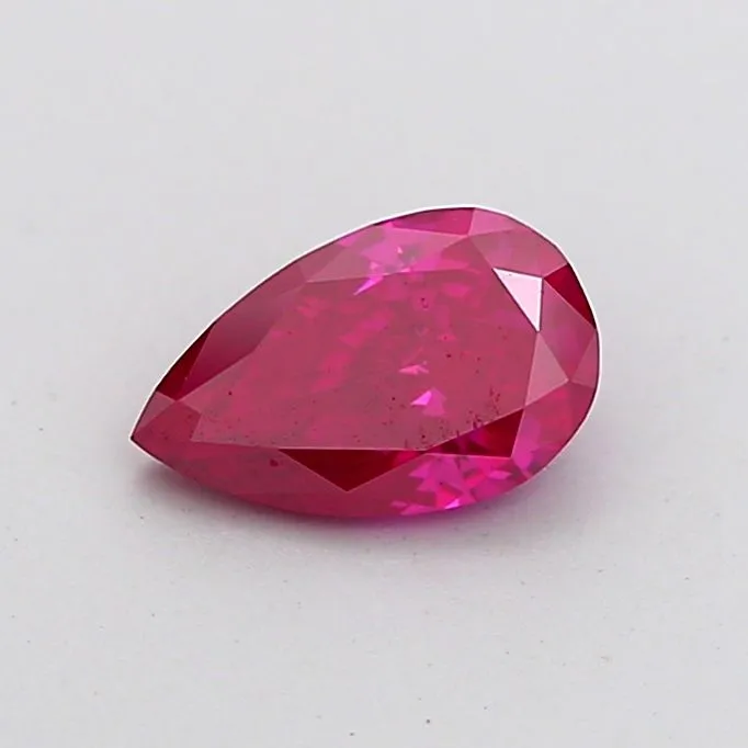 0.77ct PEAR Fancy Vivid Pink VS2 Coloured Lab diamond