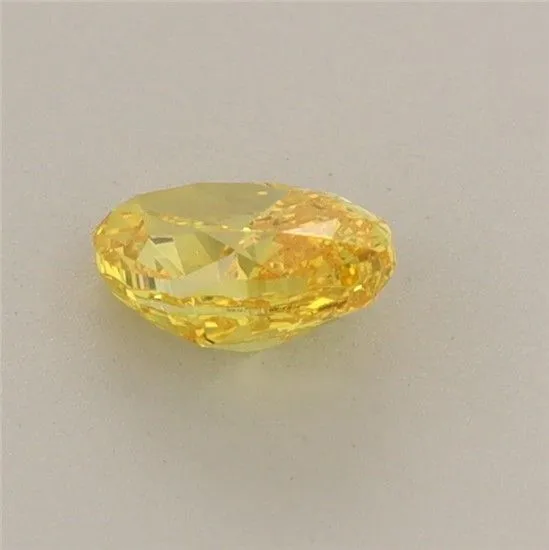 0.51ct OVAL Fancy Vivid Yellow VS1 Coloured Lab diamond