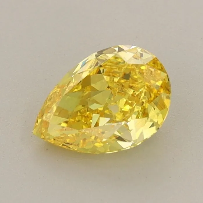 0.78ct PEAR Fancy Vivid Yellow VVS2 Coloured Lab diamond
