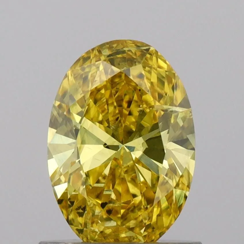 0.88ct OVAL Fancy Vivid Yellow SI2 Coloured Lab diamond