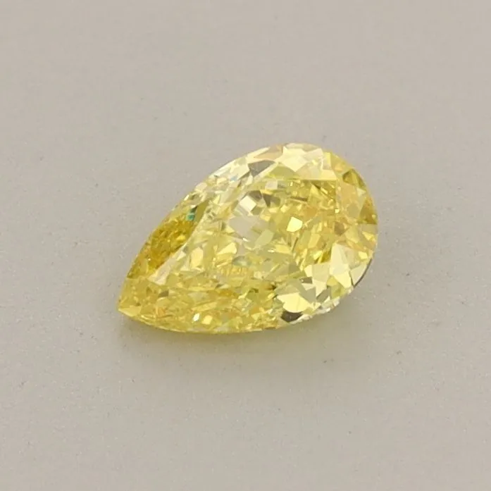 0.32ct PEAR Fancy Vivid Yellow VVS2 Coloured Lab diamond