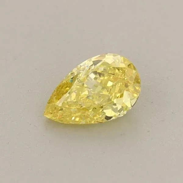 0.32ct PEAR Fancy Vivid Yellow VVS2 Coloured Lab diamond