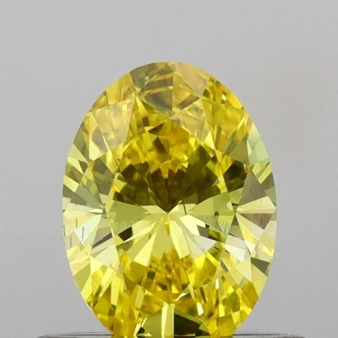 0.60ct OVAL Fancy Vivid Yellow VS2 Coloured Lab diamond