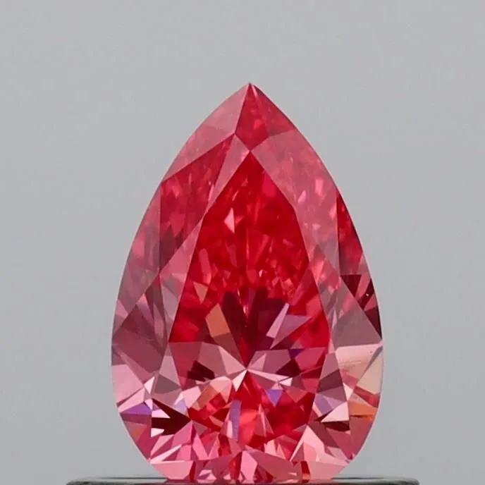 0.57ct PEAR Fancy Vivid Pink VS1 Coloured Lab diamond