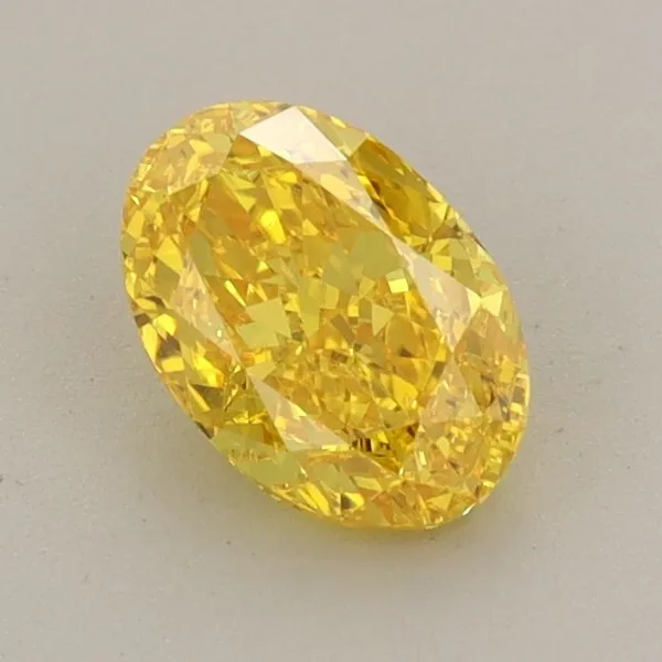 0.88ct OVAL Fancy Vivid Yellow VS1 Coloured Lab diamond